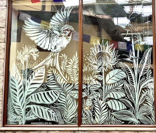 white detailed bird and flower